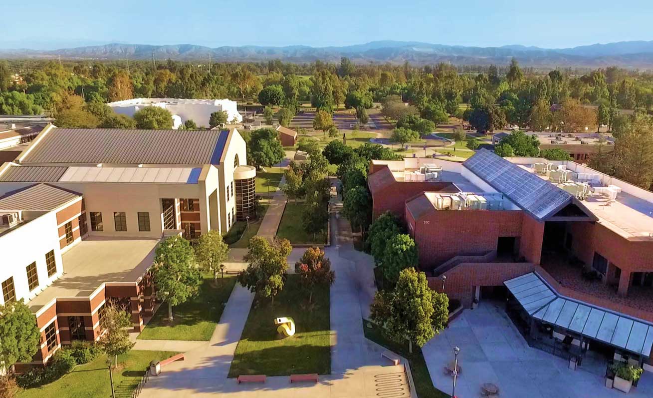 aerial view of green campus with modern buildings