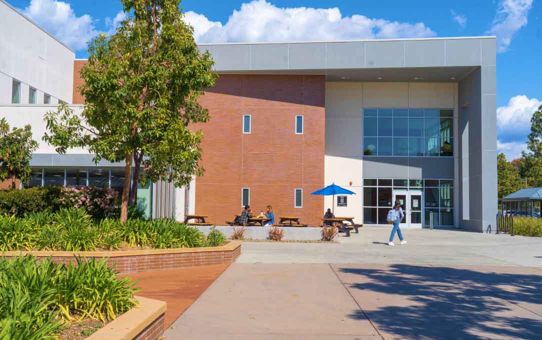 large brick building and outdoor picnic area